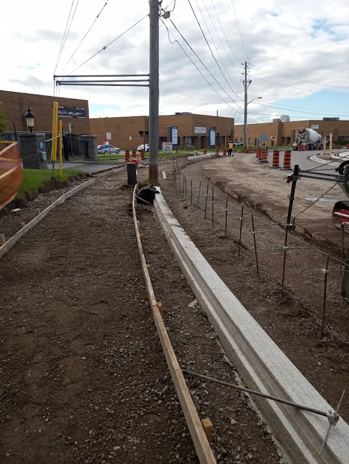 Grading and more Curb and sidewalk forms set to string lines during grading and layout checks in Toronto